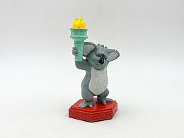 Коала на статуя с факла